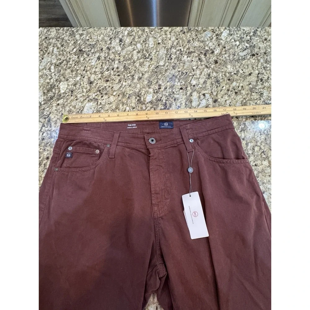 NWT AG Jeans Men The Ives Modern Athletic Straight Leg Size 33 By 32 Burgundy